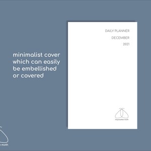 May include: A white daily planner for December 2021 with the text "DAILY PLANNER" and "DECEMBER 2021". The cover is minimalist and can be embellished. The impossible moth logo is at the bottom. The background is a muted blue.