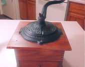 Ornate Cast Iron and wood Coffee Grinder Circa. 1950s