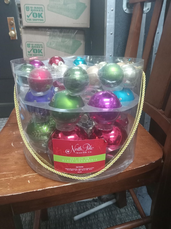 Set of 29 glass ornaments by North Pole