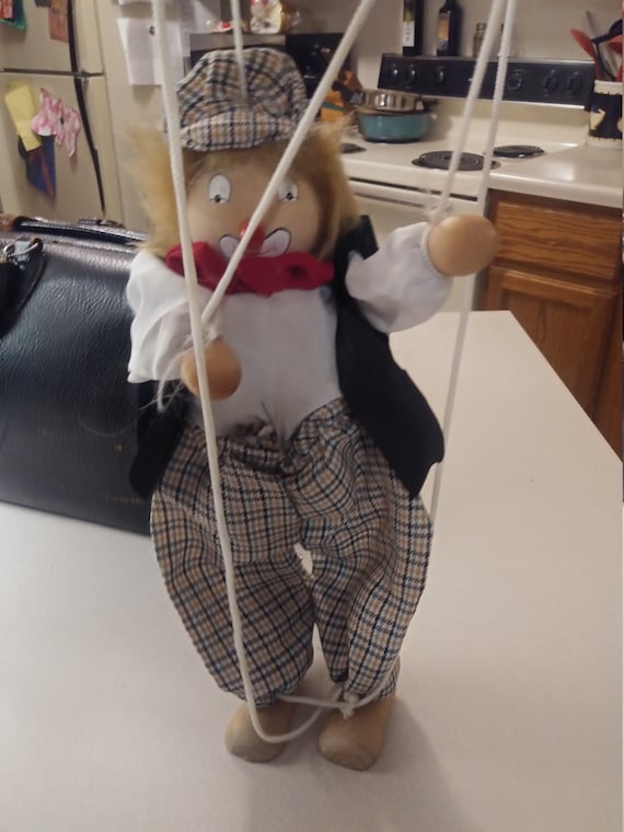 Porcelain Hobo Clown marionette with porcelain head and wooden shoes 1980s