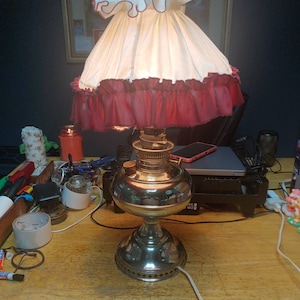 Bradley and Hubbard Nickel oil lamp that was converted to electric Circa. 1905