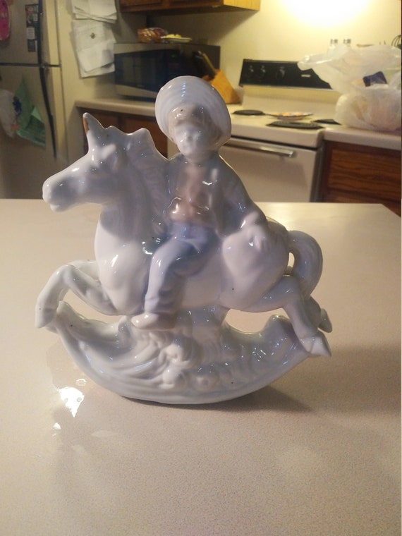 Porcelain Unicorn with boy Circa. 1960s