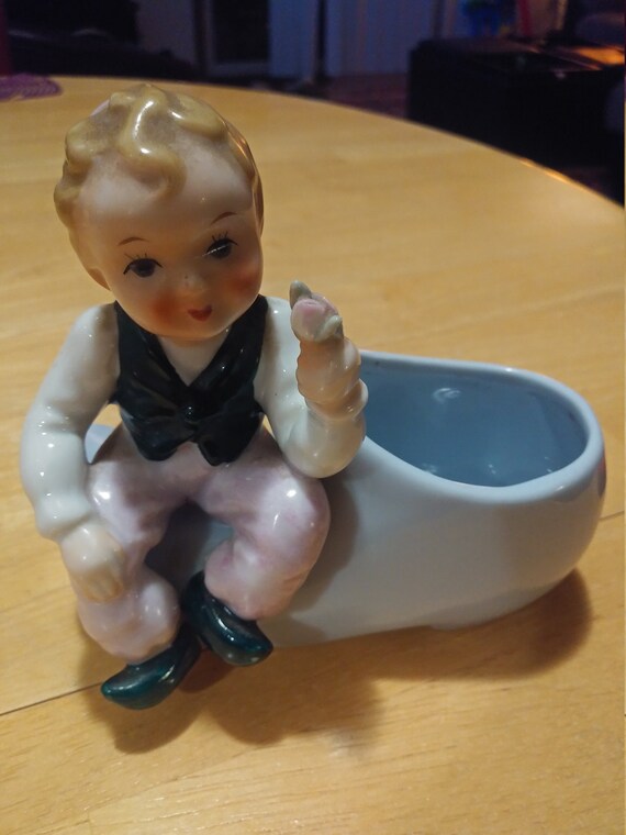 Boy on a shoe hand painted by lefton Circa. 1950s