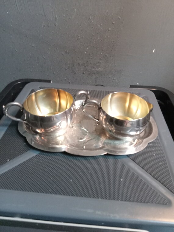 Silver cream & sugar service with etched platter.