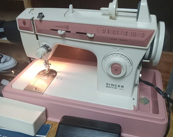 Singer Merritt 2404 sewing machine with foot pedal and accessories