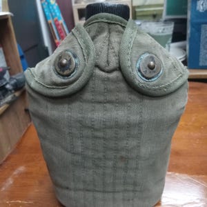WWII US Military Canteen with cover Stamped 1944