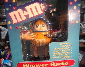 M&M Shower Radio unopened in original box and packaging.