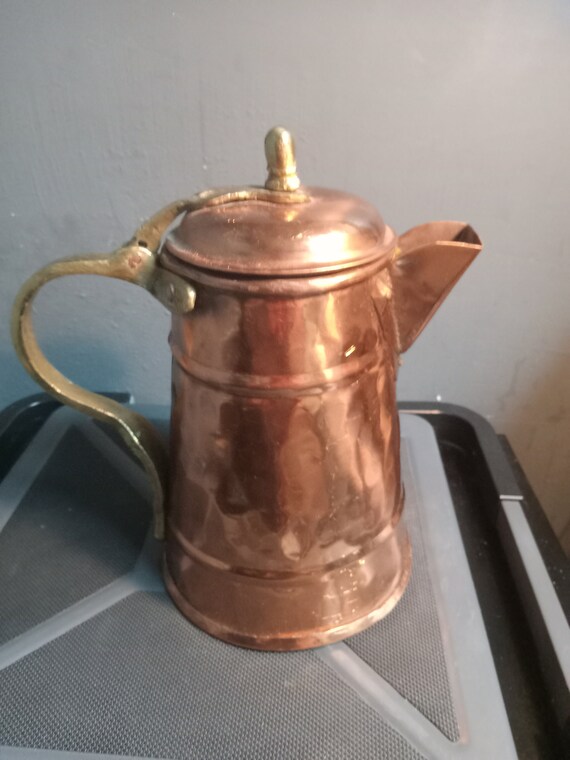 Gregorian hammered copper coffee pot with a hand wrought brass handle