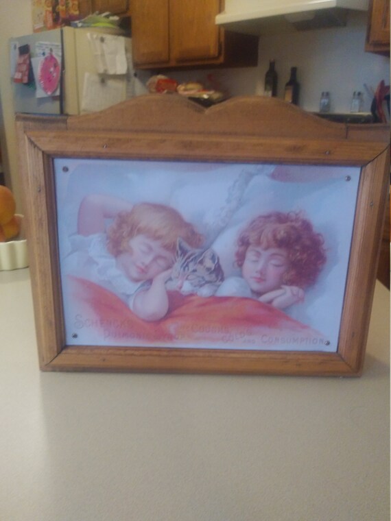 Hand Made Curio Cabnet/Jewelry box with Old time Advertisement painted over ten faceplate.