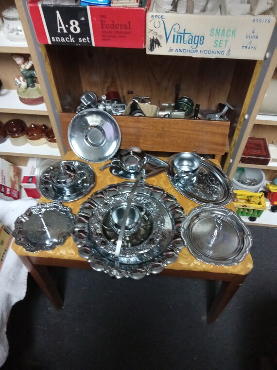 Twelve piece stainless steel serving set