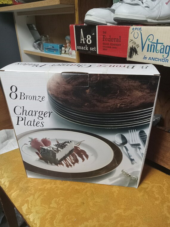 8 Bronze colored charger plates unopened