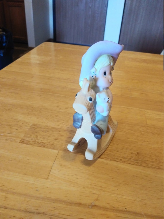 HOMCO #1417 girl on rocking horse. circa. 1980s by Home Interiors.