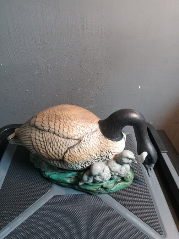 Ceramic mother goose and chick's by Holland mold