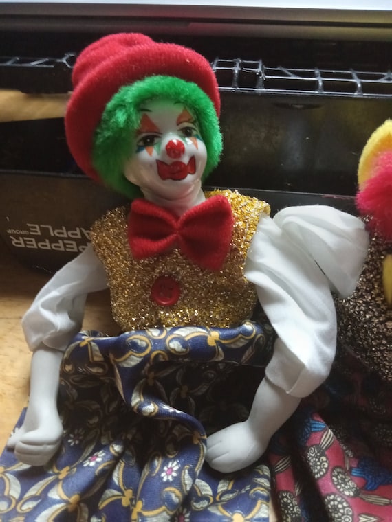 Ganz multiflex porcelain clowns
