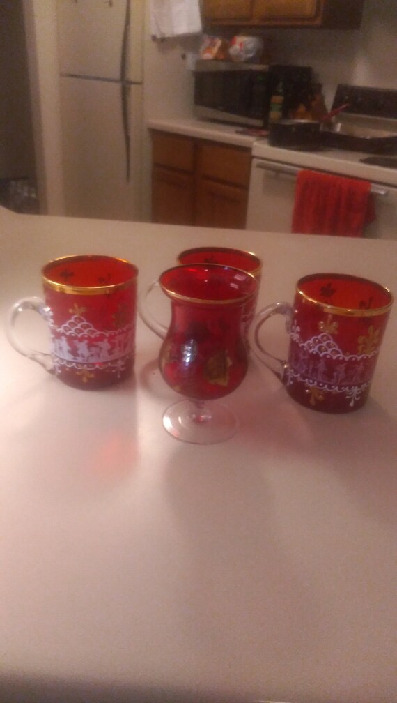 set of 4 Glass mugs with a floral wine glass.