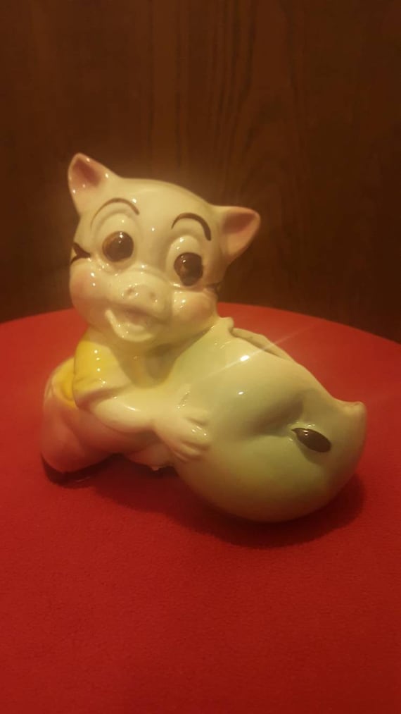 Porky Pig holding an apple by Shawnee 1950s