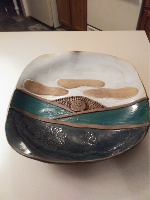 Ceramic platter Art with moon and flowers. Circa. 1980s