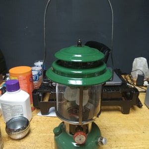 Coleman double mantle 220H lantern with Pyrex globe Circa. 1973