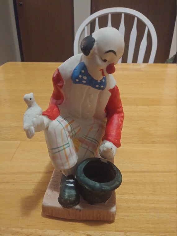 Toscany Clown pulls 2 doves out of his hat. Circa. 1980s