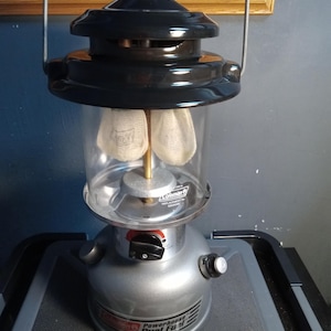 Coleman 295-700T double mantle duel fuel powerhouse lantern with box. Circa. 1999