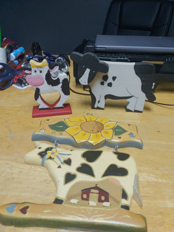 A set of wooden wall hangers Circa. 1995