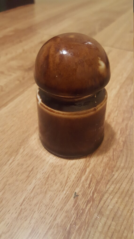 Stoneware bullet mushroom head insulator.