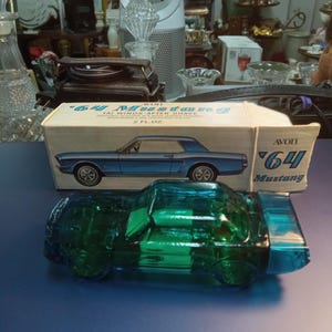 1964 Ford Mustang unopened Avon cologne bottle in original box.