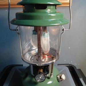Coleman 220H 195 double mantle lantern with Pyrex globe and original box. Circa. 1973 Free Shipping!