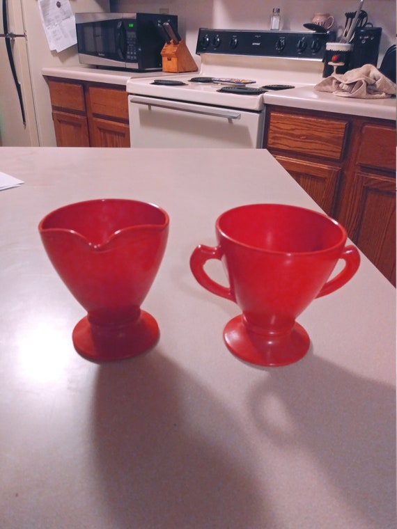 Tangerine cream and sugar Ankor Hocking Fireking glass ware Circa. 1970
