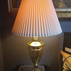 Golden lamp with shade