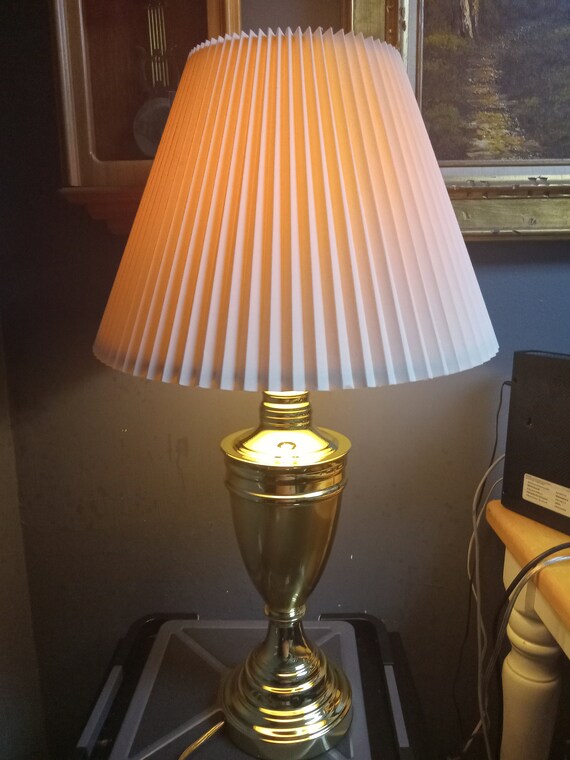 Golden lamp with shade