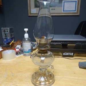 Finger loop oil lamp with chimney Circa. 1920s
