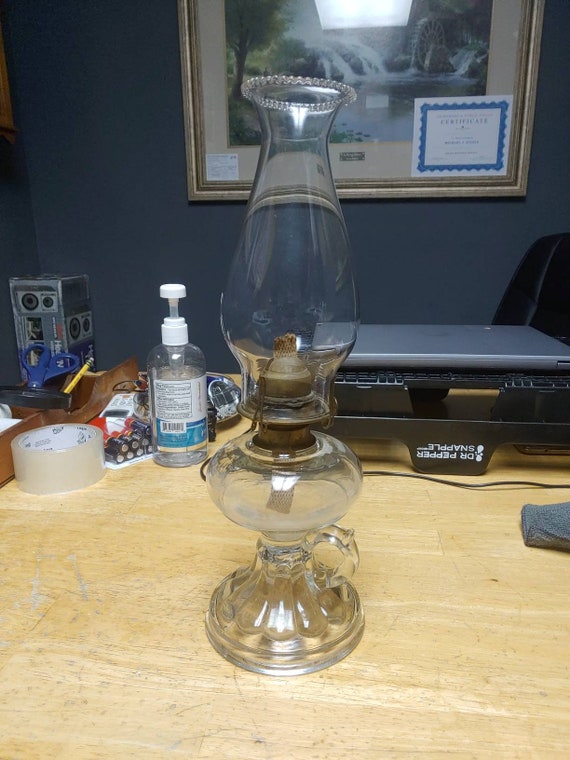 Finger loop oil lamp with chimney Circa. 1920s