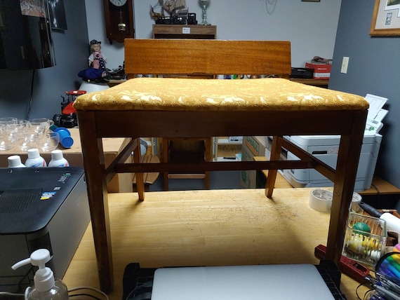 Low back upholstered bench chair Circa. 1960s