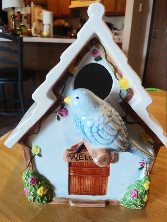 Bird Hose with blue bird Circa. 2000 by summer living.