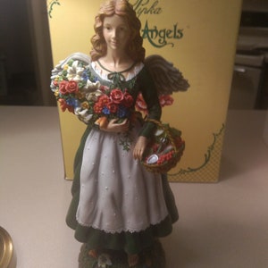 Gardening Angel by Pipka Earth Angels. Limited Edition #1394 out of only 5400 made. Circa. 1996 with original box.