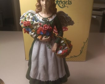 Gardening Angel by Pipka Earth Angels. Limited Edition #1394 out of only 5400 made. Circa. 1996 with original box.