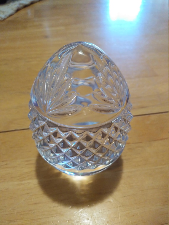 Heavy glass egg shaped paperweight made in France circa. 1980s