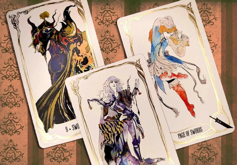 May include: Three tarot cards with gold trim and illustrations. The first card is the 9 of Swords, featuring a dark figure with horns and a cloak. The second card is the Page of Swords, featuring a figure in a blue and white outfit holding a sword. The third card is the 5 of Swords, featuring a figure with long white hair and a purple and black outfit.