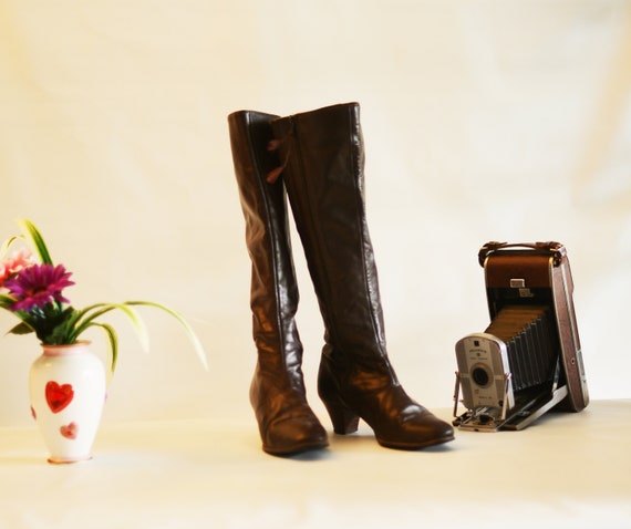 narrow knee high boots