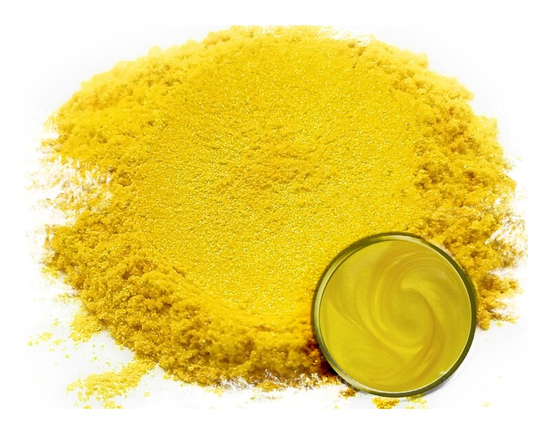 May include: A pile of bright yellow mica powder with a small sample jar of the powder.