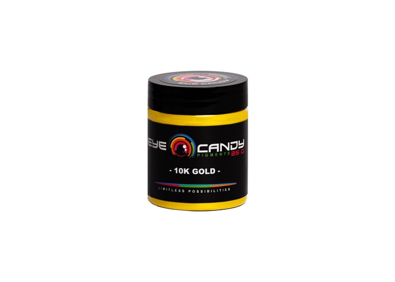 May include: A yellow jar of 10K Gold Eye Candy Pigments, a 25g jar of paint pigment for creating custom colors. The jar has a black lid and a label with the Eye Candy Pigments logo and the text "10K Gold" and "Limitless Possibilities".