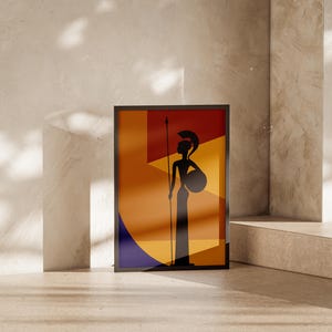 May include: Framed art print featuring a silhouette of a warrior figure with a spear and shield. The artwork has a geometric background with orange, yellow, and blue shapes. The frame is black, and the print is displayed against a neutral-toned wall.