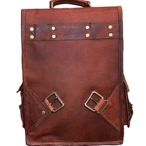 Showcasing the back of the vintage leather bag. By detachable the strap , the backpack can be converted into sleek leather briefcase,messenger bag for men women.
