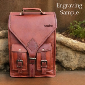 Vintage-inspired leatherucksack with personalized name or logo engraving, perfect for adding a touch of nostalgia to your travel. The engraving adds a touch of elegance and sophistication and makes for a thoughtful personalized gift