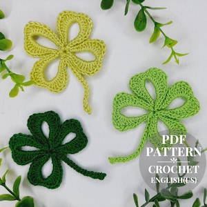 May include: PDF pattern for crocheting four-leaf clover shapes in green and yellow. The pattern is written in English (US).