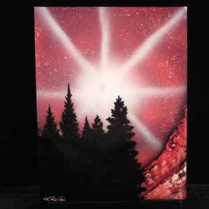 Trees with a star spray painting