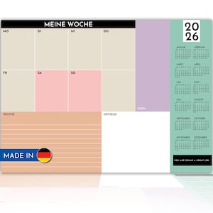 Könnte beinhalten: Ein Wochenplaner 2026 mit Farbblock-Design. Der Planer hat Abschnitte für jeden Wochentag, einen Kalender und den Text "MEINE WOCHE". Der Planer ist mit "MADE IN" und einer deutschen Flagge gekennzeichnet.