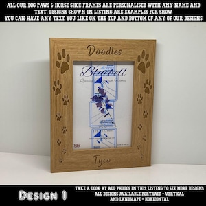 May include: A light brown wooden photo frame with paw prints etched into the corners and sides. The frame holds a photo with the text "Bluebell" and the words "Doodles" and "Tyco" etched into the wood. The frame is 7 x 5 inches.