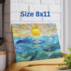 May include: A stained glass style print of a sunset over the ocean. The sun is yellow and the ocean is blue and green. The print is 8x11 inches.